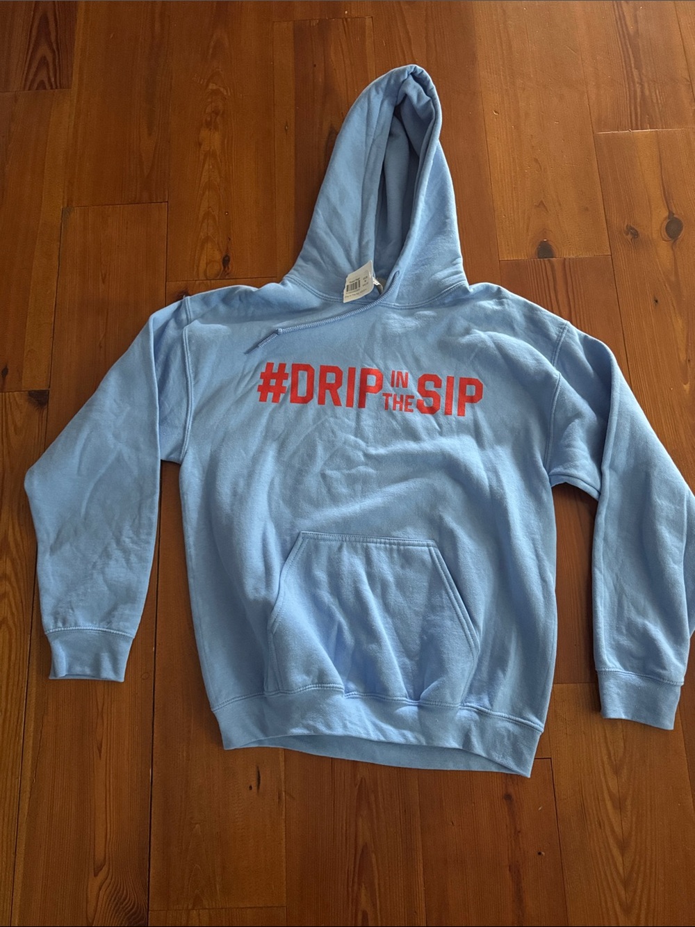 OleMiss Rebels Powder Blue Hoodie with Red “#DRIP IN THE SIP” Graphic